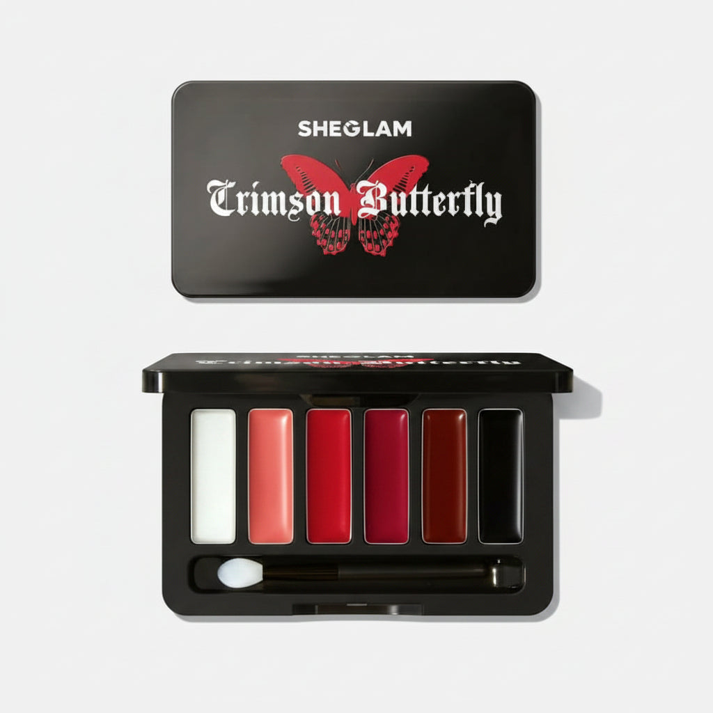 SHEGLAM Crimson Butterfly eyeshadow palette shown open, with six shades in white, coral, pink-red, deep red, brown, and black, plus a small applicator, below its black lid featuring a red butterfly logo.