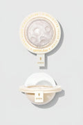 Sheglam Lunar Glow Highlighter in a cream-colored circular compact, shown both open and closed to display the moon-phase shaped pressed powder.